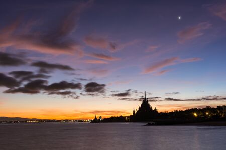 Sunrise on the sea at silhouette Sanctaury of Truth backgroundの写真素材