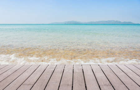 Beach Scene With Wooden Floor background can put or montage your productsの写真素材