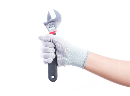 Hand gloves holding pliers. Isolated on white backgroundの写真素材