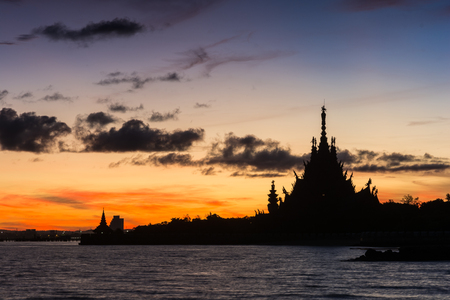 Sunrise on the sea at silhouette Sanctaury of Truth backgroundの写真素材