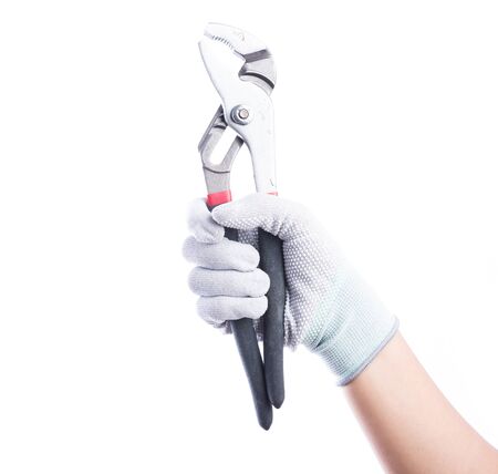 Hand gloves holding pliers. Isolated on white backgroundの写真素材