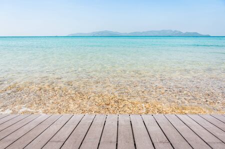 Beach Scene With Wooden Floor background can put or montage your productsの写真素材
