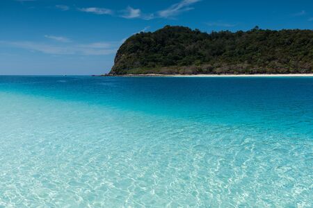 Beach on the tropical island with green water blue sky, koh rok of Thailandの写真素材