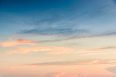 Bright Fiery orange sunset sky, cloudy sunsetの写真素材