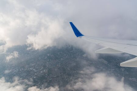 Wing aircraft at cloud sunset view from plane