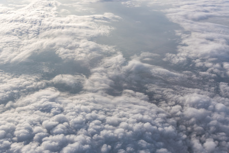Many cloud in fly above blue sky, outside airplane