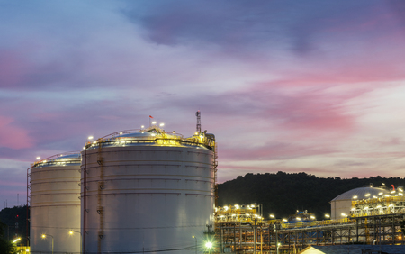 Oil petrochemical refinery plant at sunset twilightの写真素材