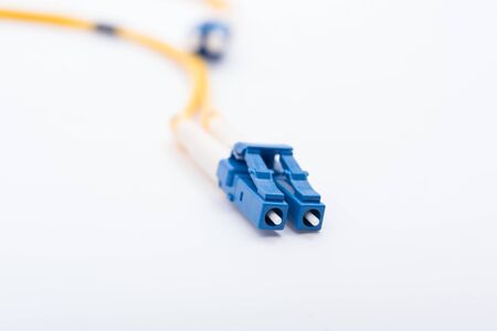Fiber optic cables single mode LC isolated on white backgroundの写真素材