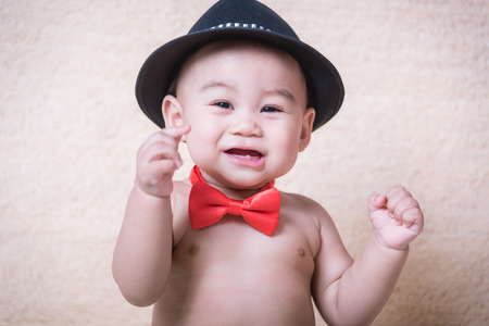 Little boy children portrait in red bow tie.の写真素材
