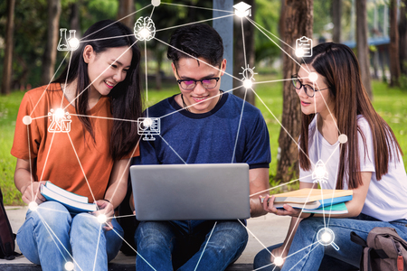 Young group friend education using technology laptop computer network connectionの写真素材