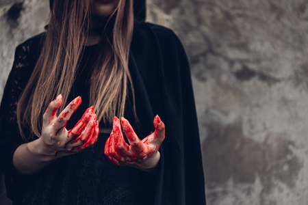 Portrait monster woman ghost and hand have red blood, halloween conceptの写真素材