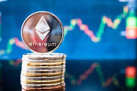 Business ethereum coin currency finance money on graph chart backgroundの写真素材