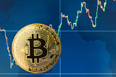 Business bitcoin coins currency finance money on graph chart backgroundの写真素材