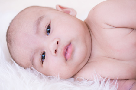 Asian baby boy child on lie supine, 2 months year old