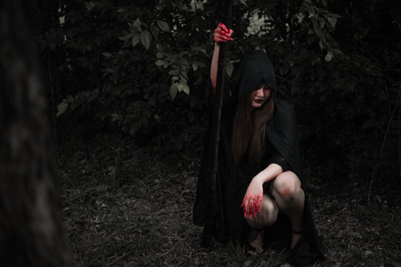 Portrait woman scary ghost in forest, halloween conceptの写真素材