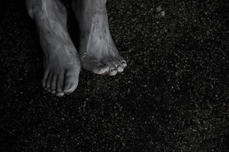 Foot of woman ghost creepy on the ground floor with copy space for textの写真素材