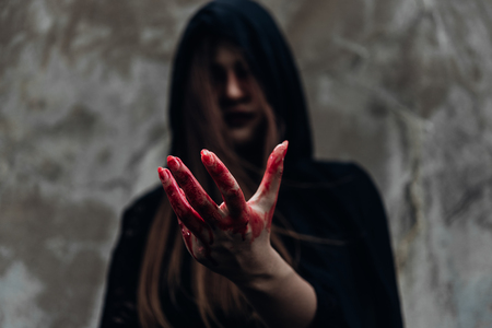 Portrait monster woman ghost and hand have red blood, halloween concept