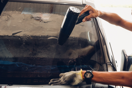 Man specialist attached window filmの写真素材