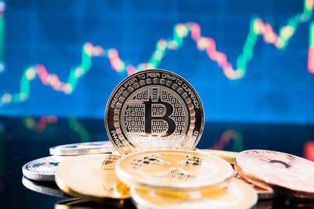 Business blockchain b bitcoin coin currency finance money on graph chart backgroundの写真素材