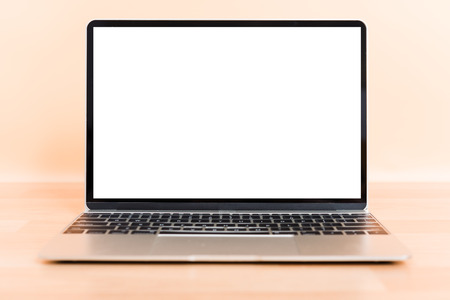 front laptop computer blank screen on desk table isolatedの写真素材