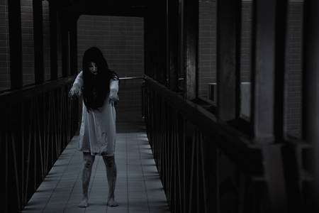 Horror woman ghost creepy on show 2 hand walking, halloween day conceptの写真素材