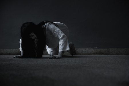 Horror woman ghost creepy crawling, halloween day conceptの写真素材