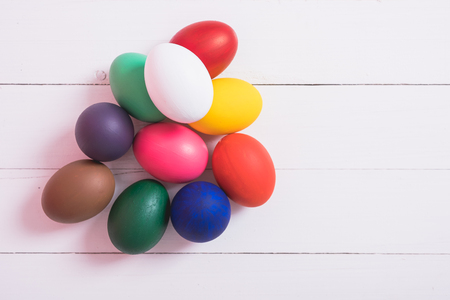 Colorful easter eggs clean on wooden background, easter day conceptの写真素材