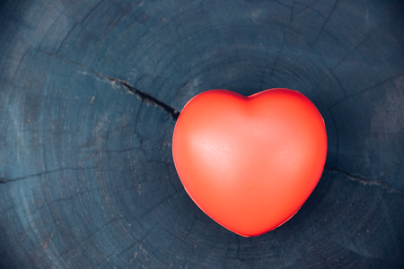 Red heart love on wooden background, valentine day conceptの写真素材