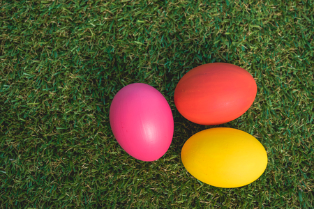 Top view of Easter eggs clean on grass background, easter day conceptの写真素材