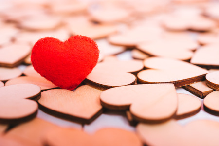 Red hearts stand on pink background with copy space, valentine day conceptの写真素材