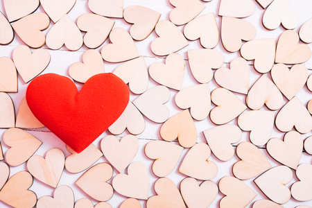 Hearts on white wooden background, valentine day conceptの写真素材