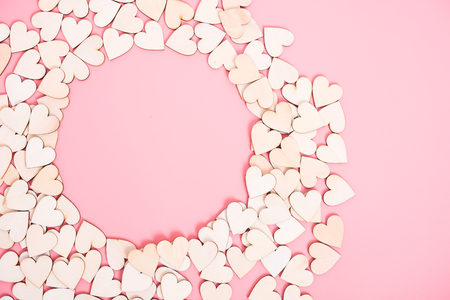 Wood hearts on pink background have sphere copy space, valentine day conceptの写真素材