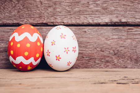 Beautiful Easter egg on wooden background, Easter day conceptの写真素材