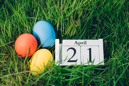 Easter egg on garden grass background, 21 April, Happy easter day conceptの写真素材