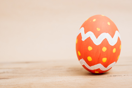 Beautiful Easter Red egg on wooden background, Easter day conceptの写真素材