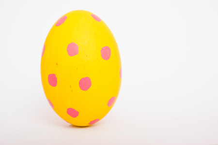 Beautiful Easter Yellow egg color isolate on white background, Easter day conceptの写真素材