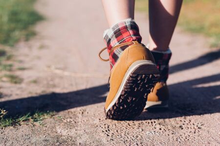 Close up Legs of couple hiking walking outdoor in nature forestの写真素材