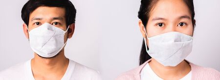 Asian beautiful woman and man wearing protection face mask against coronavirus her looking to camera, studio shot isolated on white background with copy space, COVID-19 or corona virus conceptの写真素材