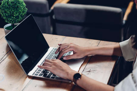 Beautiful women lifestyle freelancer working independently outside of the home office with a laptop...