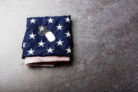 Traditional folded of America United States flag and tag, memorial remembrance and thank you of...