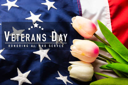 America United States flag and tulip flower, memorial remembrance and thank you of hero, studio shot with copy space background, USA holiday Veterans or Independence day conceptの写真素材