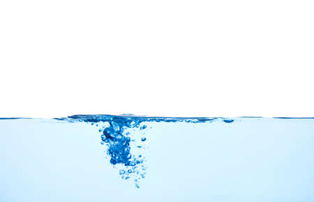 Light blue water wave with air bubbles and a little bit splashed underwater, studio shot isolated on...