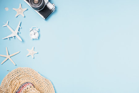 Flat lay top view mockup retro camera films, airplane, starfish, shells, hat traveler tropical...