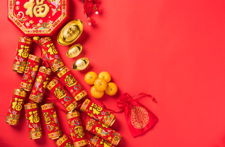 Chinese new year 2021 festival, Flat lay top view lunar new year or Happy Chinese new year celebration decorations with copy space on red background (Chinese character "fu" meaning fortune good luck)の写真素材