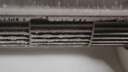 Dirty dust dense on squirrel cage fan in air conditioner indoor at home, bad maintenance conditioning need to cleaningの写真素材