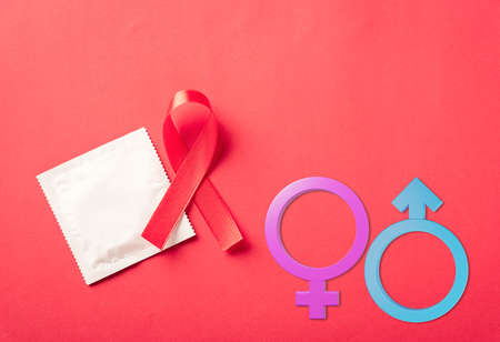 Red bow ribbon symbol HIV, AIDS cancer awareness, condom with shadows and Male, female gender signs,...