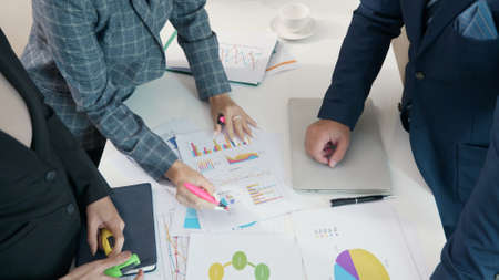 Business team meeting present briefing the project analyzing income charts graphs at office,...
