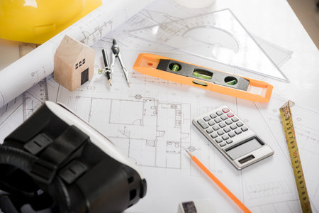 Architect workplace top view. Architectural blueprint paper project plans on desk table, tool for...