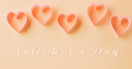 Happy Valentines Day. Above pink ribbon heart shaped decorative symbol isolated on pastel background, love romance concept, template banner design with copy space, Mother, Woman dayの写真素材