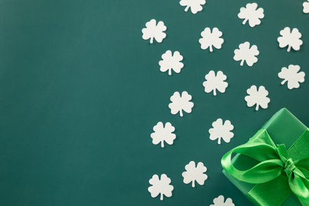 St Patricks Day decoration background concept. shamrocks leaves holiday symbol with copy space on...